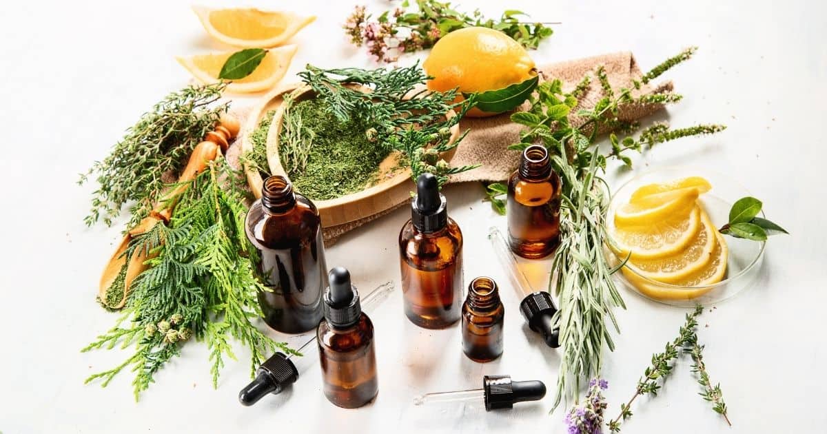 aromatherapy essential oils with fruits and herbs